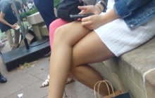 Babe with sexy legs filmed by horny voyeur