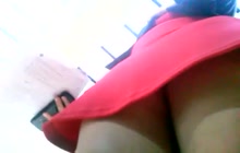 Chick in sexy red skirt on spy cam
